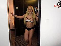 Slim blonde teen in fishnets cums.