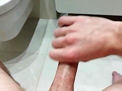 solo guy jerks and spills in bathroom session