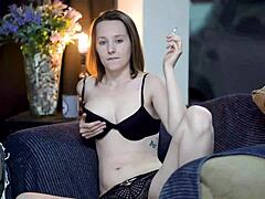 Sexy Brunette In Black Lingerie Smoking Seductively For Voyeur Eyes