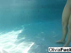 olivia's having a blast nude in the pool, join her!