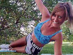 Kayla Kandy feels the burn in her workout video.