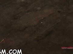 Lovable brunette darling is sitting on her huge fake penis