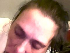 A mature black man gets a blowjob from a small woman