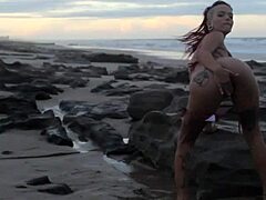 Explosive climax on beach with African lesbian massage