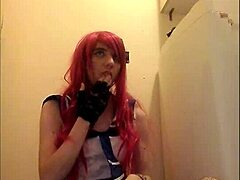 Redhead crossdresser's solo performance with a happy ending
