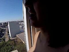 Naked Woman Poses At Hotel Window Near Airport