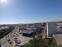 Naked Woman Poses At Hotel Window Near Airport