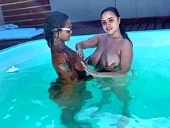 Auntie and niece have fun in the pool with two friends