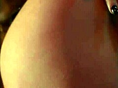 Tattoo girl in uniform and miniskirt at bdsm studio