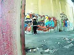 Chubby couple bangs hard against public street wall.