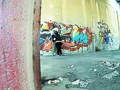 Chubby couple bangs hard against public street wall.