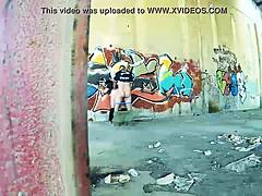 Amateur couple uses wall for hard sex outside