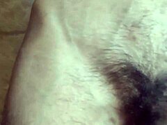 Gay guy masturbates and cums while playing with his navel