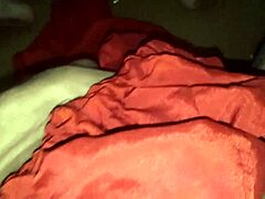 Horny Indian bisexual shemale masturbates in red silk satin