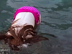 misha lowe shows off by the pool