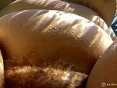 BBW Woman with Natural Features Enjoys Public Nudity in Relaxed Setting