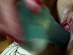 Blonde tattooed woman uses dildo for detailed masturbation