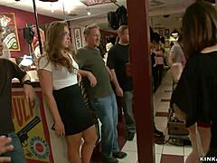 A slut gets a deep throat fucking in a tattoo shop