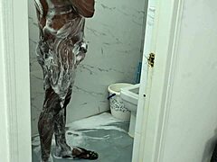 Steamy shower scene with an Asian man and an Iranian MILF