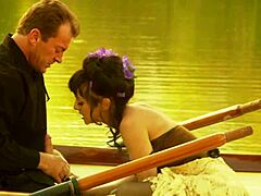 damn, this cute girl with small tits rode a tough guy on a boat! what a wild ride!