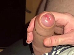 Guy moans while edging, shooting precum through underwear