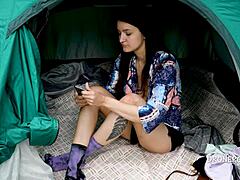 Alisa experiments with nipple stickers for the first time outdoors.