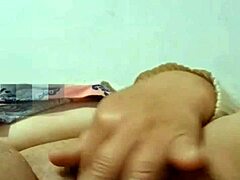 Grandma enjoys her carrot in the bedroom