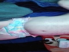 Baby pup prepares with diaper padding in this promo.