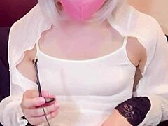 masked beauty shemale masturbates on camera