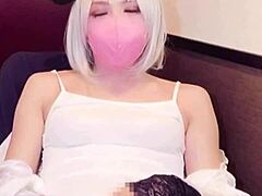 masked beauty shemale masturbates on camera