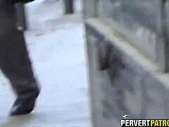 filming a couple through the window in outdoor amateur setup