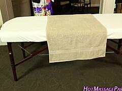 Hot Asian masseuse provides relaxing handjob service.