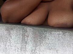 Latina Amateur Shows Big Natural Tits To Guys On The Street From Window