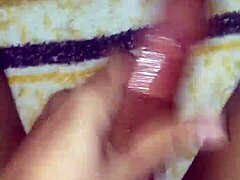 Two toys are used together for intense fucking, leading to cum flowing freely