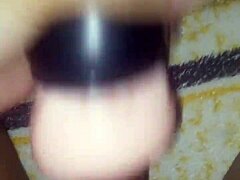 Two toys are used together for intense fucking, leading to cum flowing freely