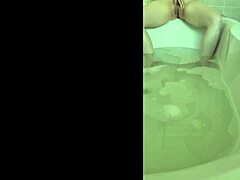 Solo bath leads to horny orgasm.