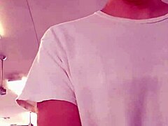 Simple selfie of Asian enjoying workout in public gym