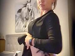 Little teaser undresses in striptease