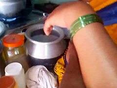 Desi Bhabhi Engages in Homemade Sex in Kitchen