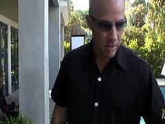 A knock at the door turns into steamy sex with a milf sporting big fake tits