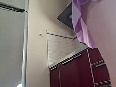 Watch this babe with natural tits suggestively cooking while touching her pussy and masturbating