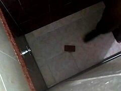 Conversational Shower spy cam catches horny friend licking pussy in bathroom voyeur action
