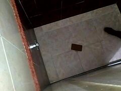 Conversational Shower spy cam catches horny friend licking pussy in bathroom voyeur action