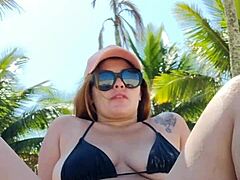 She wears a short bikini to the beach