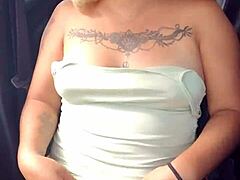 Latina whore showing tits and panties in car on highway