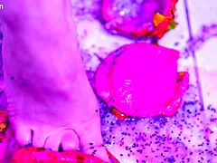 uhh bare toes crushing juicy fruit in wet femdom fetish with latina goddess