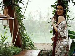 A busty milf strips and rips clothes in solo tease