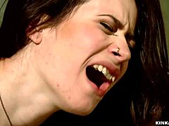 tied up lesbian gets paddled and dominated in a kinky session with choking and deepthroat