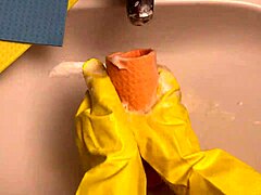 Hot housewife washes dildo after using it in her pussy!