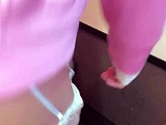 Is this cute Asian ladyboy masturbating in crossdressing gear?